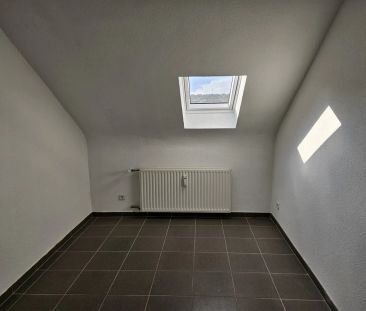 Moderne Dachgeschosswohnung in ruhiger Lage - Foto 1