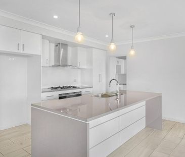 Modern 4 Bedroom Family Home on Low Maintenance, Fenced Block - Photo 2