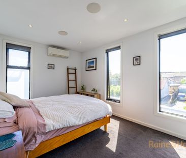 Stunning 2-Bedroom, 2-Bathroom Townhome in a Prime Location - Photo 1