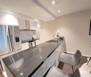 Double Level Apartment in Great Location - Photo 2