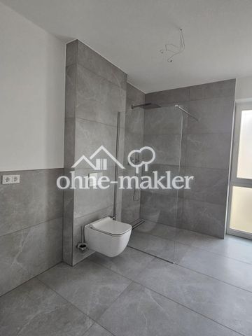 **Stilvoller Neubau-Charme! Helle Erdgeschosswohnung im Grünen!!** - Photo 4