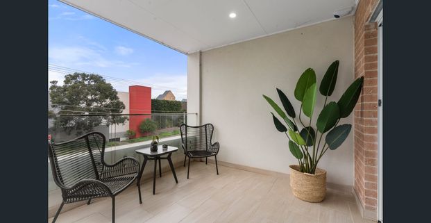 Stylish Near-New Duplex in Prime Location - Photo 1