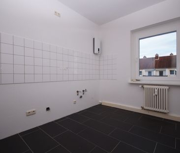 Familienfreundliche 3-Zimmer-Wohnung mit Balkon - Foto 4