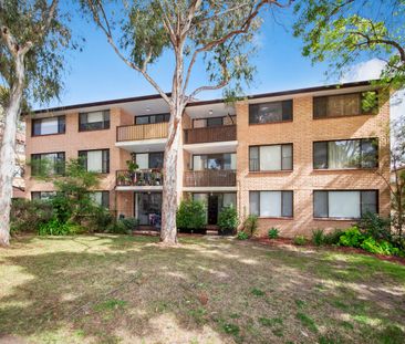 BRIGHT AND SPACIOUS TWO BEDROOM UNIT WITH LOCKUP GARAGE - Photo 2