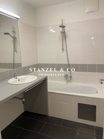 HELLES 2-ZIMMER-APARTMENT MIT GARTENTERRASSE ( BJ 2007 ) - Foto 3