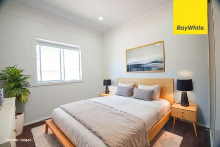 COMFORTABLE & UPDATED THREE BEDROOM FAMILY HOME LOCATED IN A QUIET STREET - Photo 2