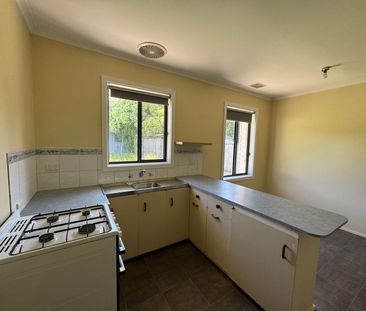 Neat Three-Bedroom Home in Prime Location - Photo 6