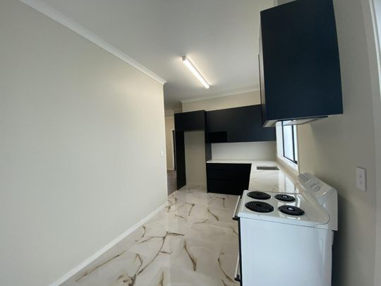 Stylish new two-bedroom - Photo 1