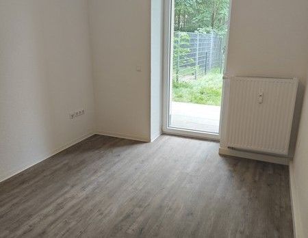 Erstbezug... 2 Raum Wohnung mit Terrasse und Einbauküche... - Foto 1