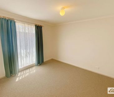 Freshly updated and low maintenance living - Photo 1
