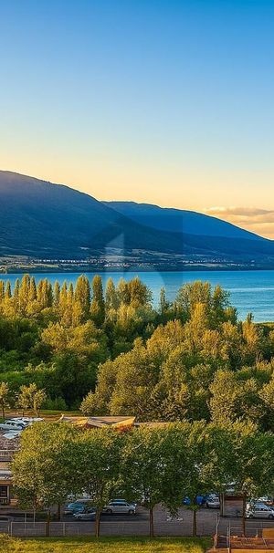 VUE IMPRENABLE SUR LE LAC ET LA VILLE - Photo 1