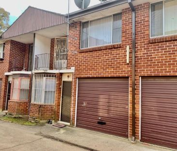 Neat and Tidy Town House - Photo 1