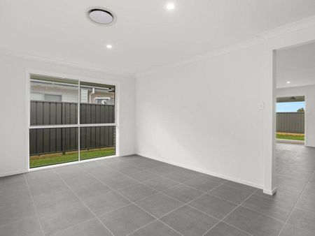 BRAND NEW 4- BEDROOM FAMILY HOME- COMFORT, STYLE & LOCATION! - Photo 4