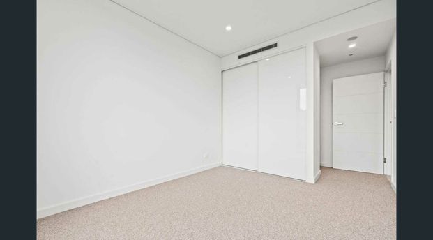 Brand New Luxury Apartment with Stunning Water Views in highly desirable location. - Photo 1