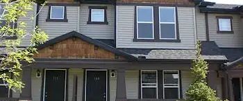 Conveniently Located 3 Bedrooms + 2 Parking Family Town Home in Panorama Hills — 3 Bedrooms Townhouse - Photo 1