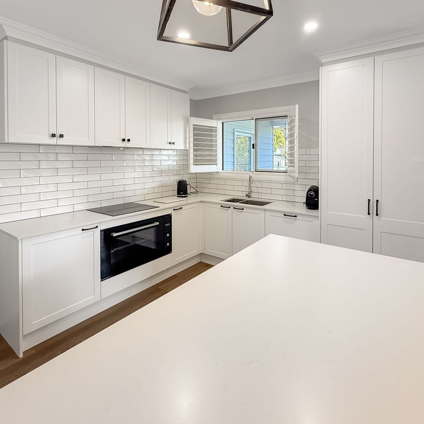 HAMPTON STYLE HOME WITH A TOUCH OF ELEGANCE - Photo 1