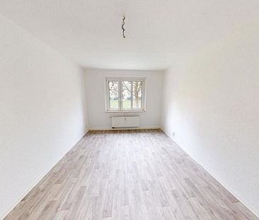 In ruhiger Seitenstraße gelegene 2-Raum-Wohnung mit Balkon - Foto 1