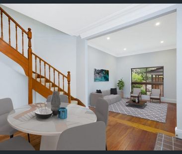 Private, Sun-Drenched Semi Offering Effortless Indoor-Outdoor Living - Photo 1