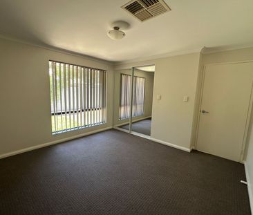 Fall in love with this stunning 4 bedroom 2 bathroom home. - Photo 4