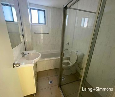 Well presented two-bedroom unit - Photo 2