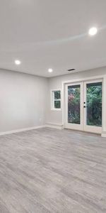 Everything Included! Beautiful & Bright 2 bedroom Basement Apartment - Photo 3