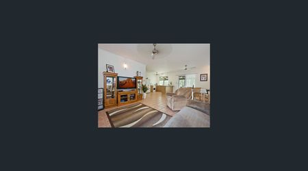 BEAUTIFULLY PRESENTED TROPICAL FAMILY OASIS IN SOUGHT-AFTER MOULDEN - Photo 4