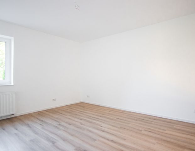 Kernsanierte Erdgeschosswohnung mit Garten, Einbauküche und Wintergarten in Bielefeld Stieghorst - Photo 1