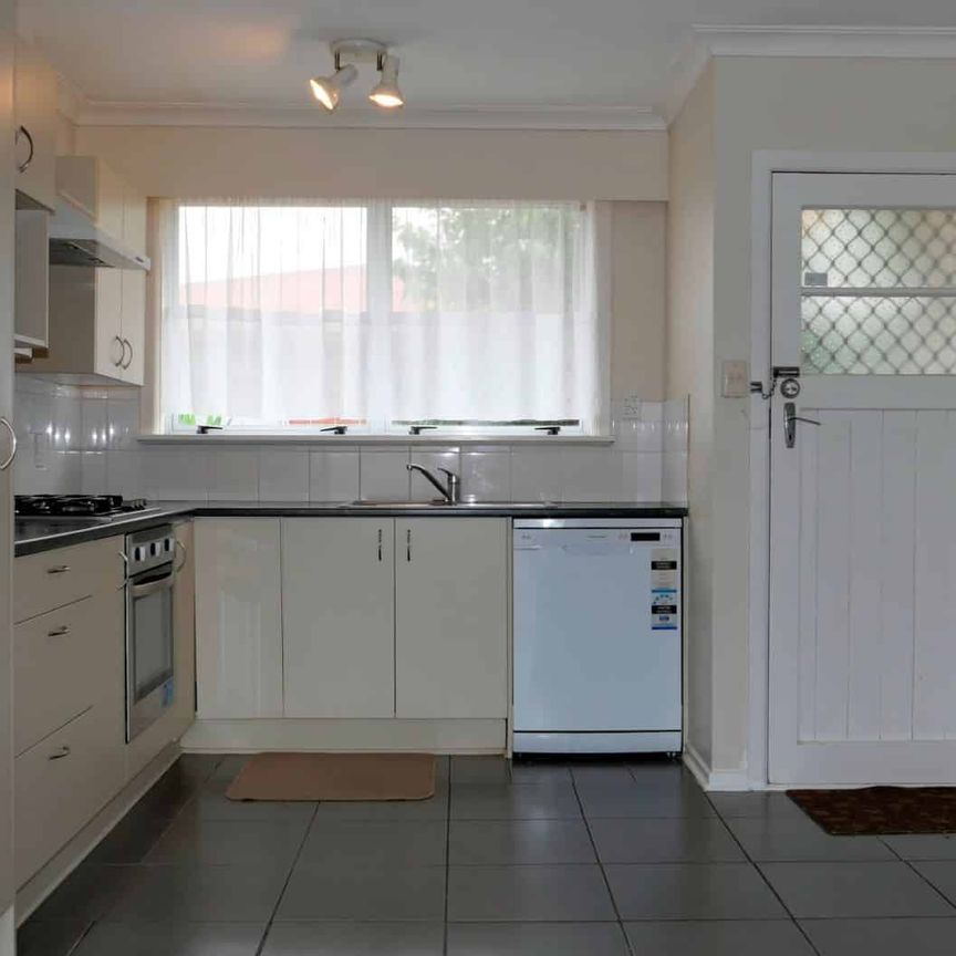 Well-Located Three-Bedroom Home with Garage - Photo 1