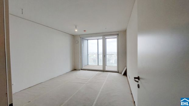 TOWER HOMES – Exklusiver Erstbezug mit Saunabereich & Rooftop-Pool! - Photo 1