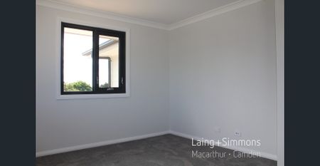 Brand New - 5 Bedroom + Multiple Living Areas - Photo 3