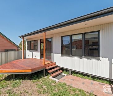 BRAND-NEW ECO-FRIENDLY LIVING IN A QUIET BUTLER STREET SETTING - Photo 6
