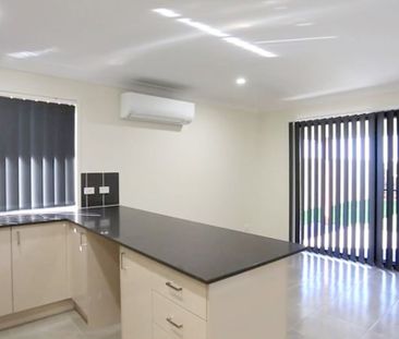 Modern Four Bedroom Home with Large Backyard - Photo 3