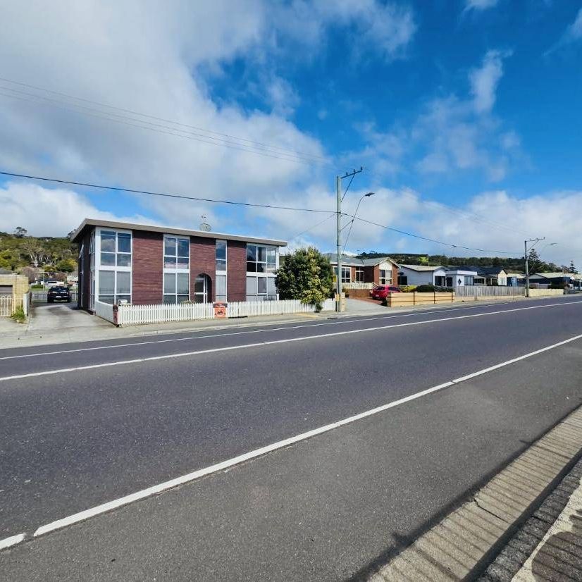 Location! Location! Location! Living close to town but with Ocean Views - Photo 1