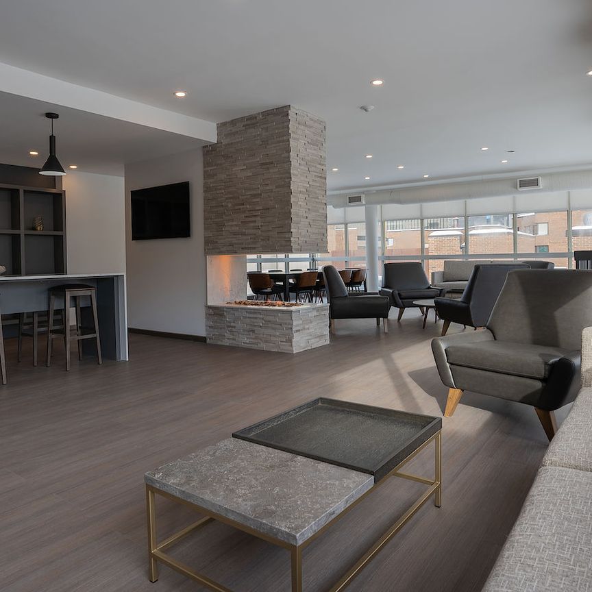 Steps to the Lyon O-Train Station: Building amenities include a gym, party room, lounge, and rooftop patio - Photo 1