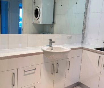 Two Bedroom Unit in Great Location - Photo 3