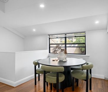Dual Level Two Bedroom Apartment with Secure Parking, EV Charger + ... - Photo 3