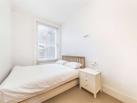 This is a charming two double bedroom property on a popular residential road in Baron's Court. - Photo 3