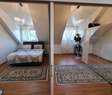 Grosszügige Dachwohnung mit Balkon! 1. Monat GESCHENKT! - Photo 4