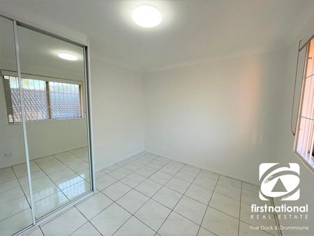 RENOVATED TWO BEDROOM APARTMENT WITH LOCK UP GARAGE - Photo 3