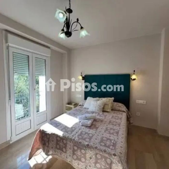 Casa adosada en alquiler en Calle Partidor - Photo 1