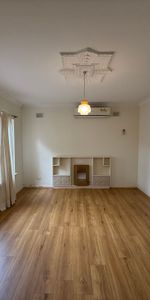 Spacious Family Home in Highly Sought-After Location - Photo 3