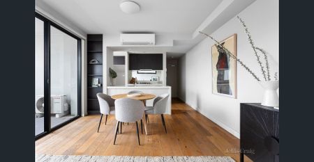 Contemporary Dual-Level Apartment in Vibrant City-Edge Location - Photo 2