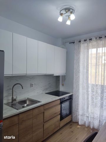 Închiriez apartament nou zona Beta Residence Chinteni - Photo 2