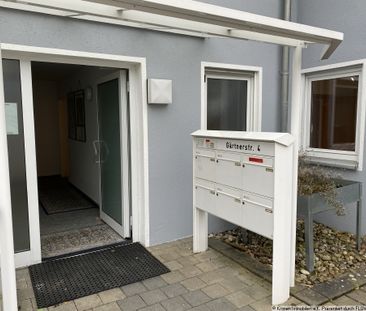 3-Zimmer-Erdgeschosswohnung mit eigenem Garten und Tiefgaragenstell... - Foto 1