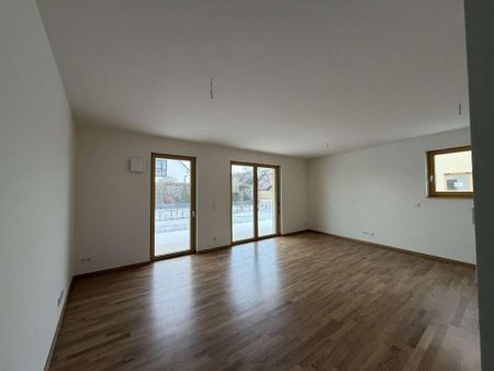 Barrierefreie 3-Zimmer-Wohnung mit Gartenanteil Inkl. Einbauküche am Cospudener See - Photo 2