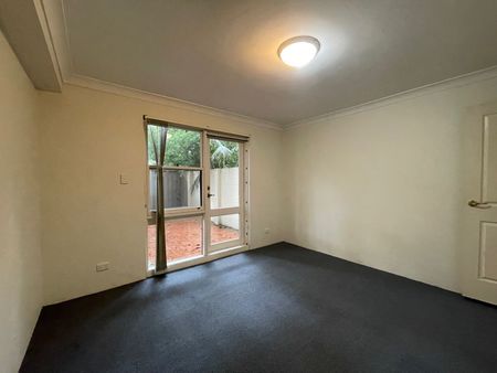 Tranquil sanctuary with lock up garage, convenient hassle-free urban living - Photo 3