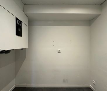 Ruim, gelijkvloers appartement met 2 slaapkamers, terras en een aut... - Photo 6