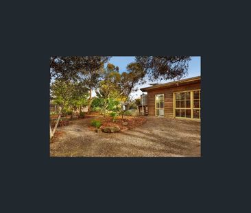 Versatile Three-Bedroom Home with Garage/Mancave Entertaining Space... - Photo 6