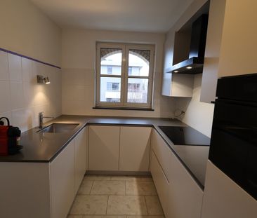 Een gerenoveerd appartement op de 2de verdieping van 102m² met 2 sl... - Photo 5