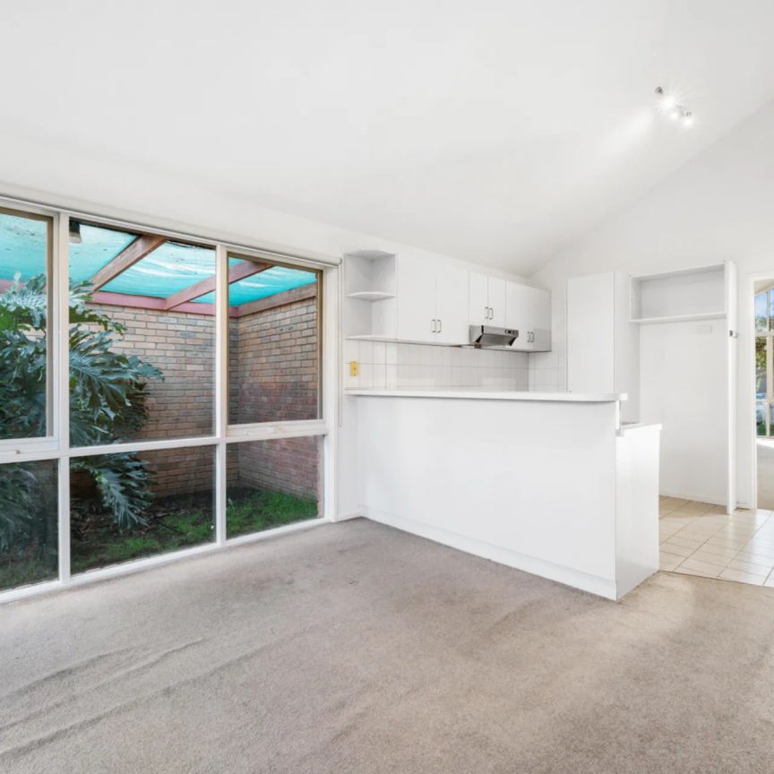 Newly Re-Carpeted 2 Bedroom, 2 Living, With Secure Double Garage Townhouse - Photo 1